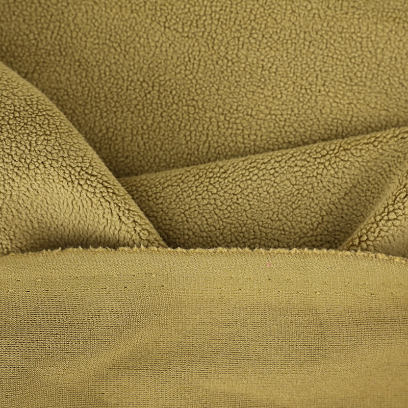 Vad gör Plush Fleece -tyg till ett mångsidigt och hållbart val för moderna textilier?